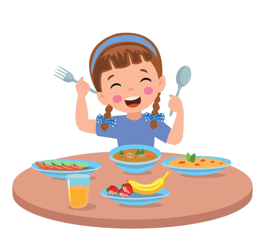mignon petit garçon mangeant à la table du dîner vecteur