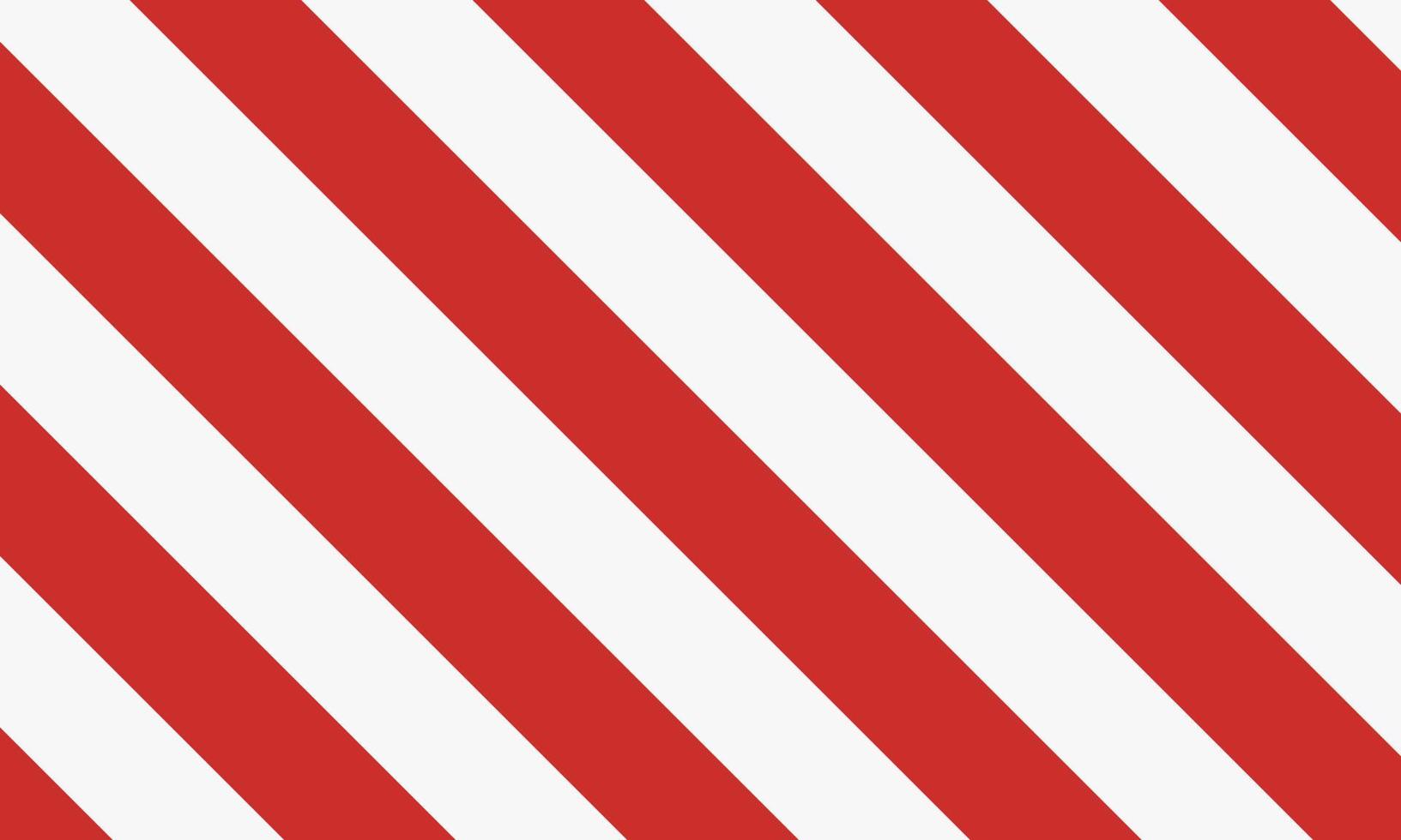 motif rayé de canne en bonbon. rayures diagonales rouges et blanches vecteur