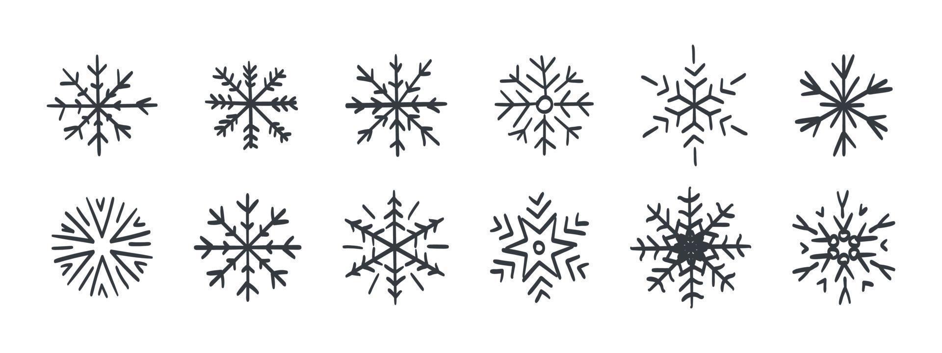 flocons de neige. un ensemble de flocons de neige dessinés à la main. flocons de neige de styles et de formes différents. illustration vectorielle vecteur