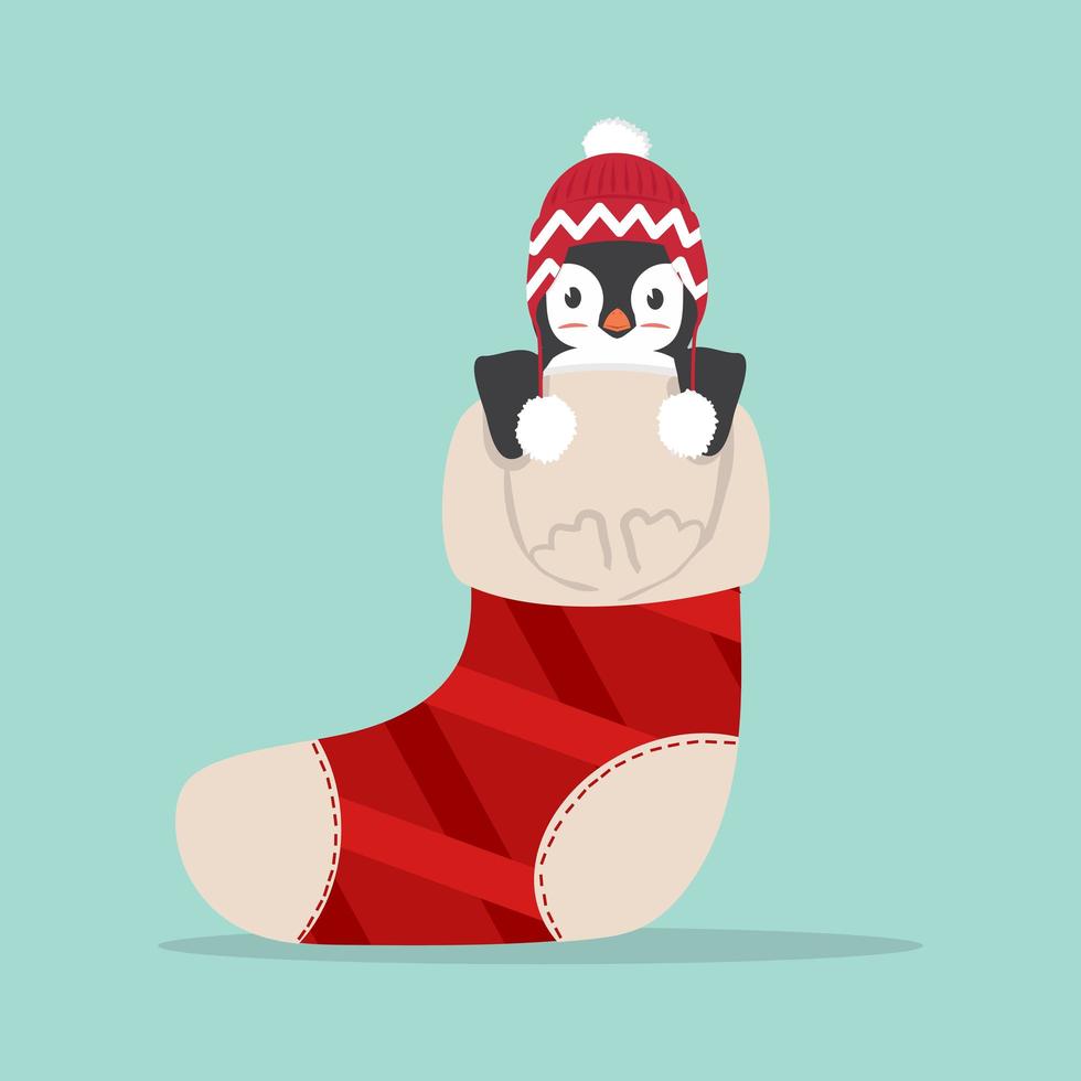 mignon pingouin en chaussette d'hiver vecteur