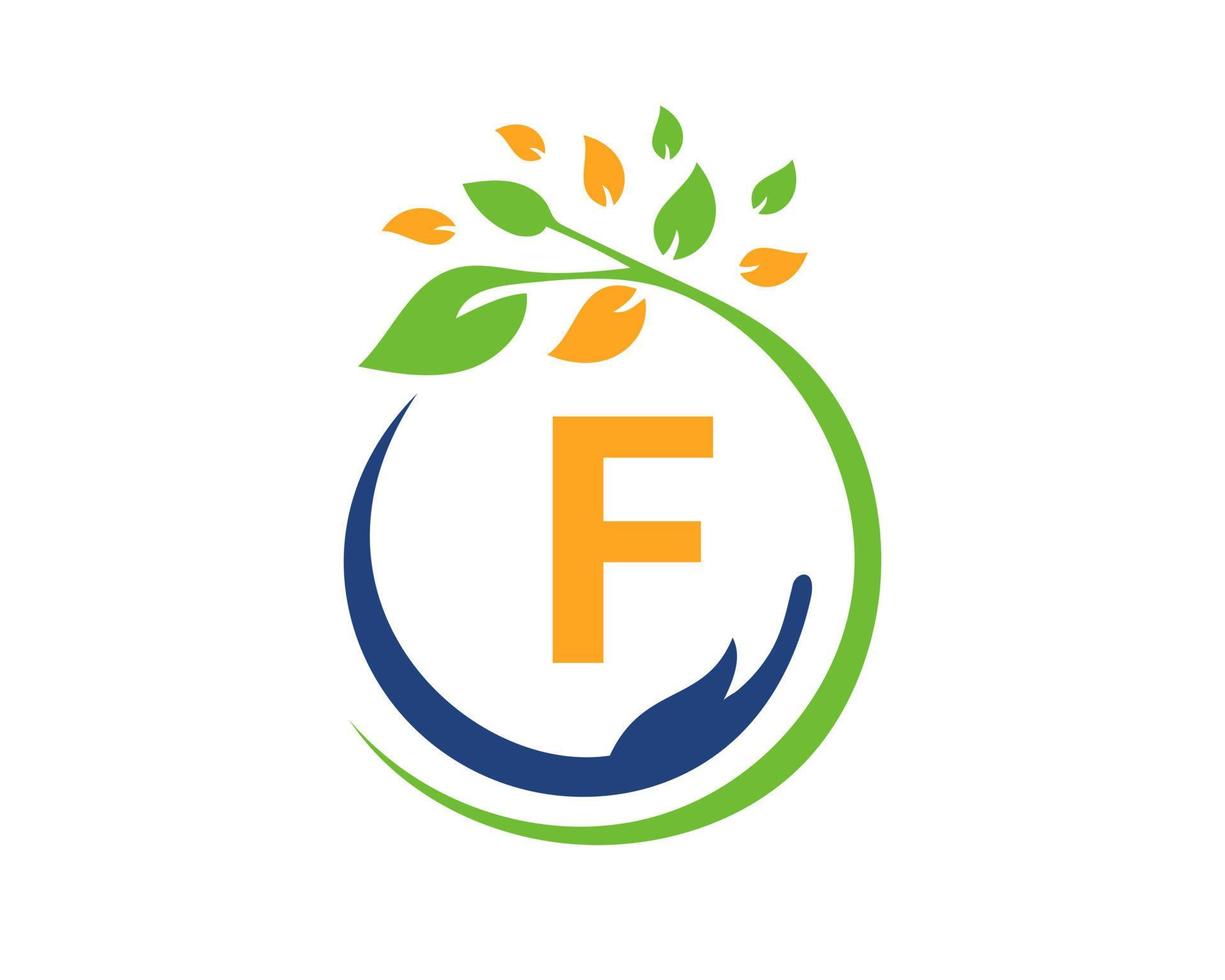 lettre f logo caritatif avec main, feuille et concept. logotype de fondation pour le soin des mains vecteur