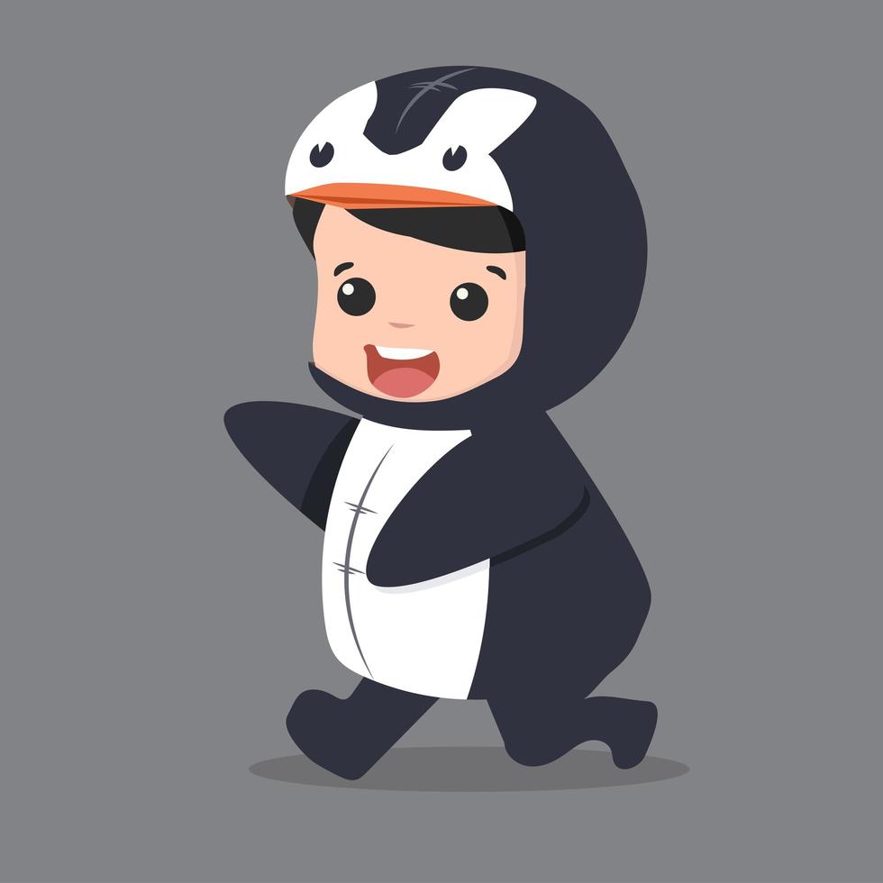 enfant mignon en costume de pingouin vecteur