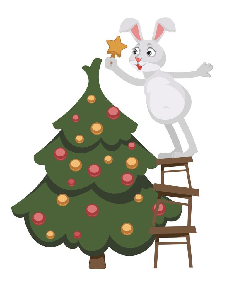 personnage de lapin décorant un sapin pour noël vecteur