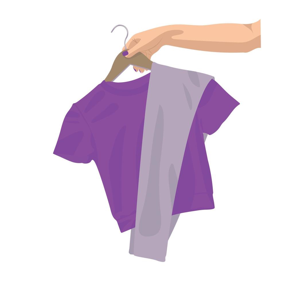 main de femme tenant des vêtements sur un cintre. illustration vectorielle dans le style de croquis. vecteur