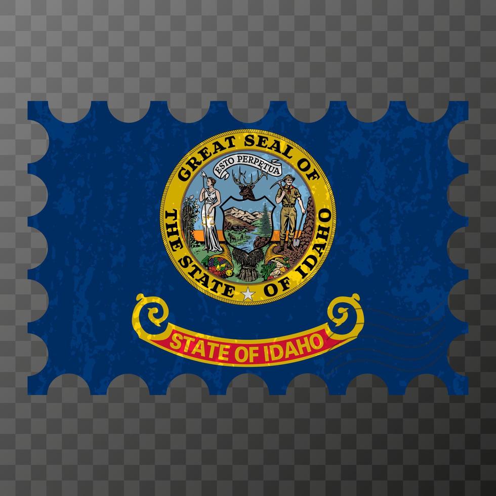 timbre-poste avec le drapeau grunge de l'état de l'idaho. illustration vectorielle. vecteur
