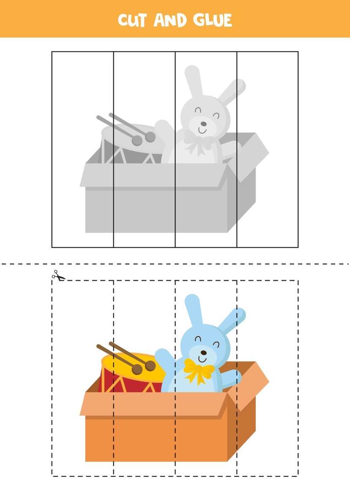 jeu de coupe et de colle avec boîte avec lapin jouet et tambour. vecteur