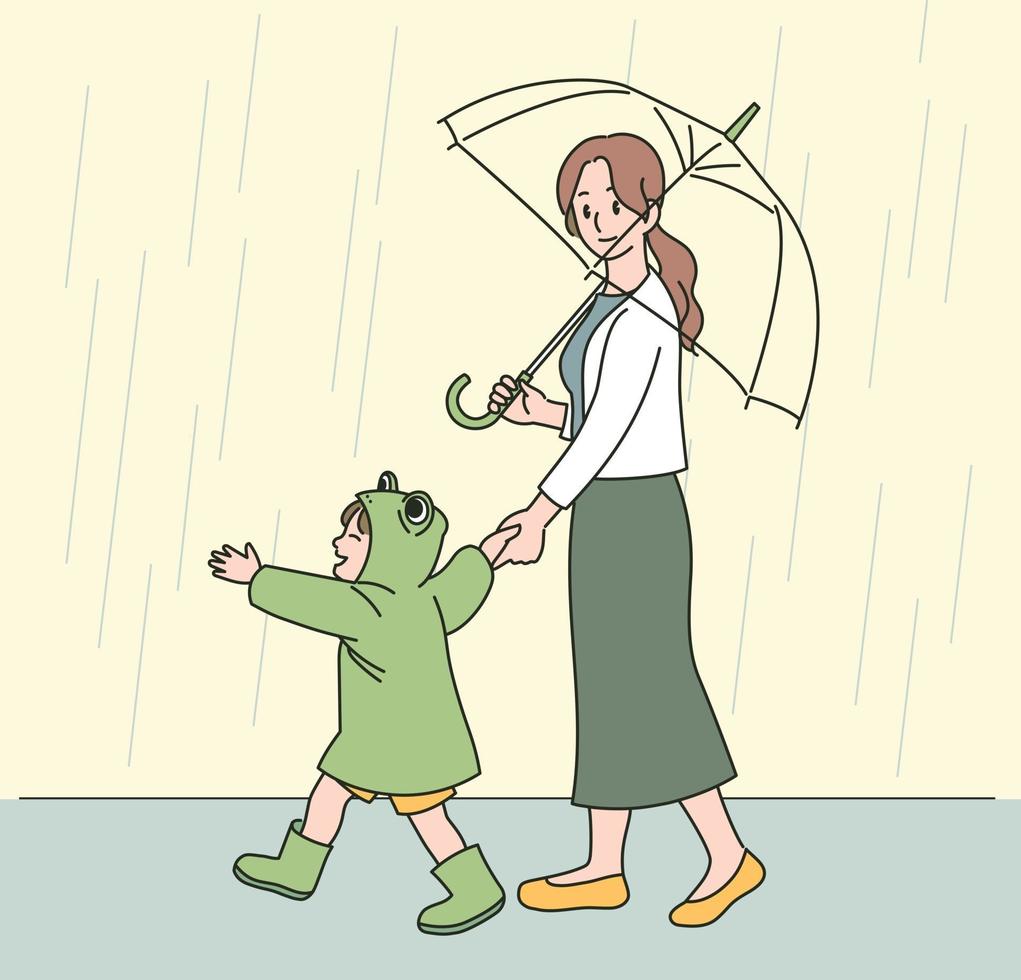 une mère et un enfant en imperméable grenouille marchent joyeusement sous la pluie. illustrations de conception de vecteur de style dessiné à la main.