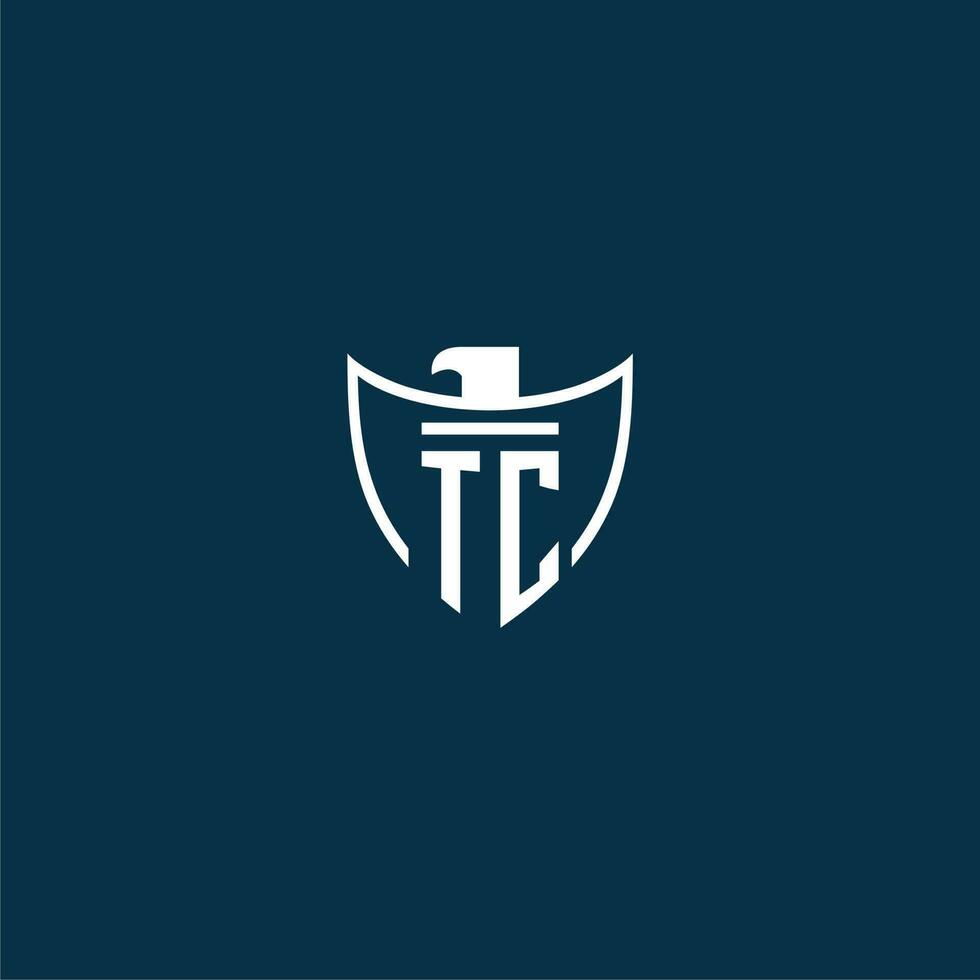 tc initiale monogramme logo pour bouclier avec Aigle image vecteur conception