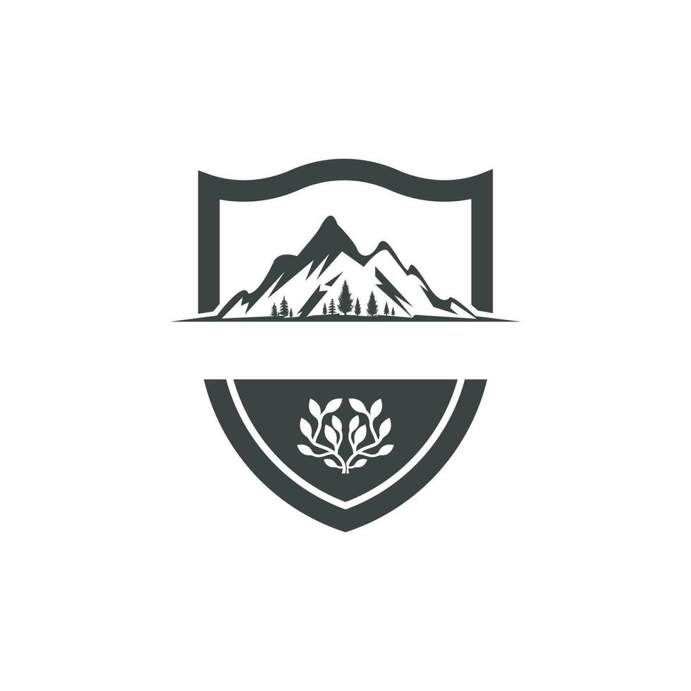 logo de bouclier de montagne vecteur