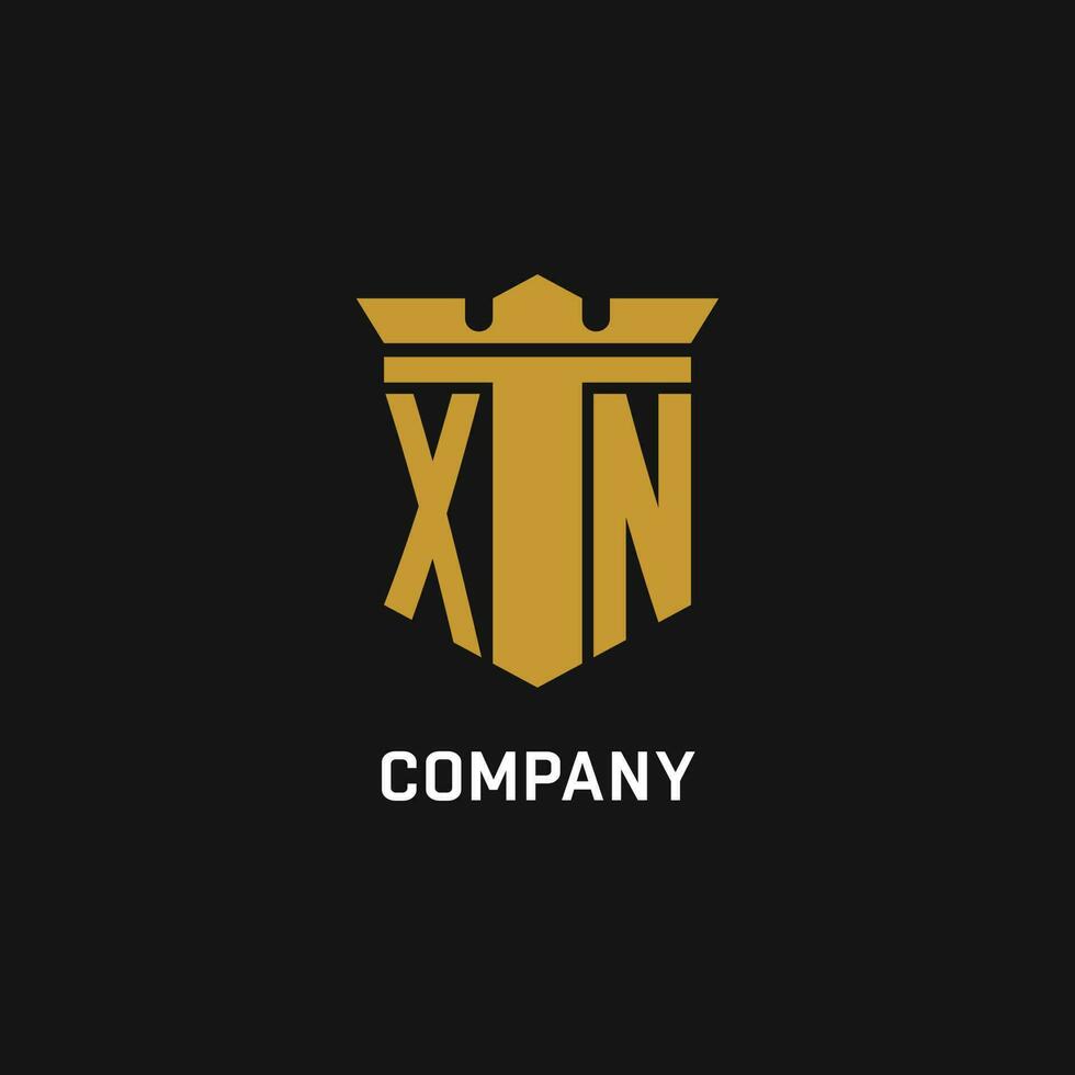 xn initiale logo avec bouclier et couronne style vecteur