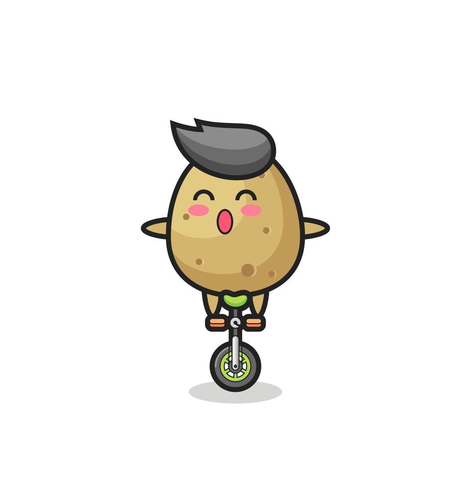 le personnage mignon de pomme de terre fait du vélo de cirque vecteur