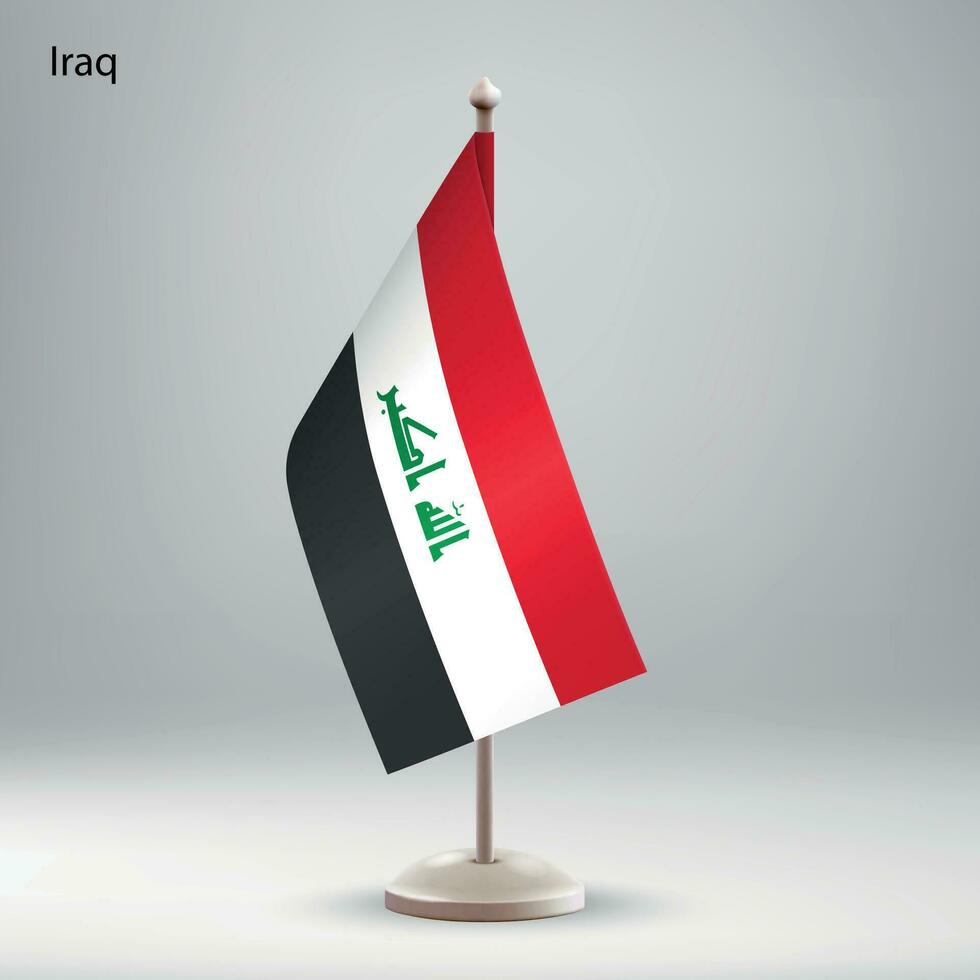 drapeau de Irak pendaison sur une drapeau rester. vecteur