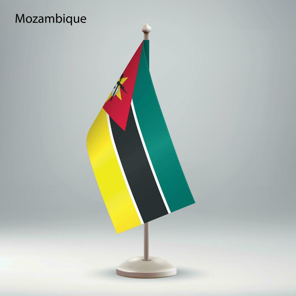 drapeau de mozambique pendaison sur une drapeau rester. vecteur