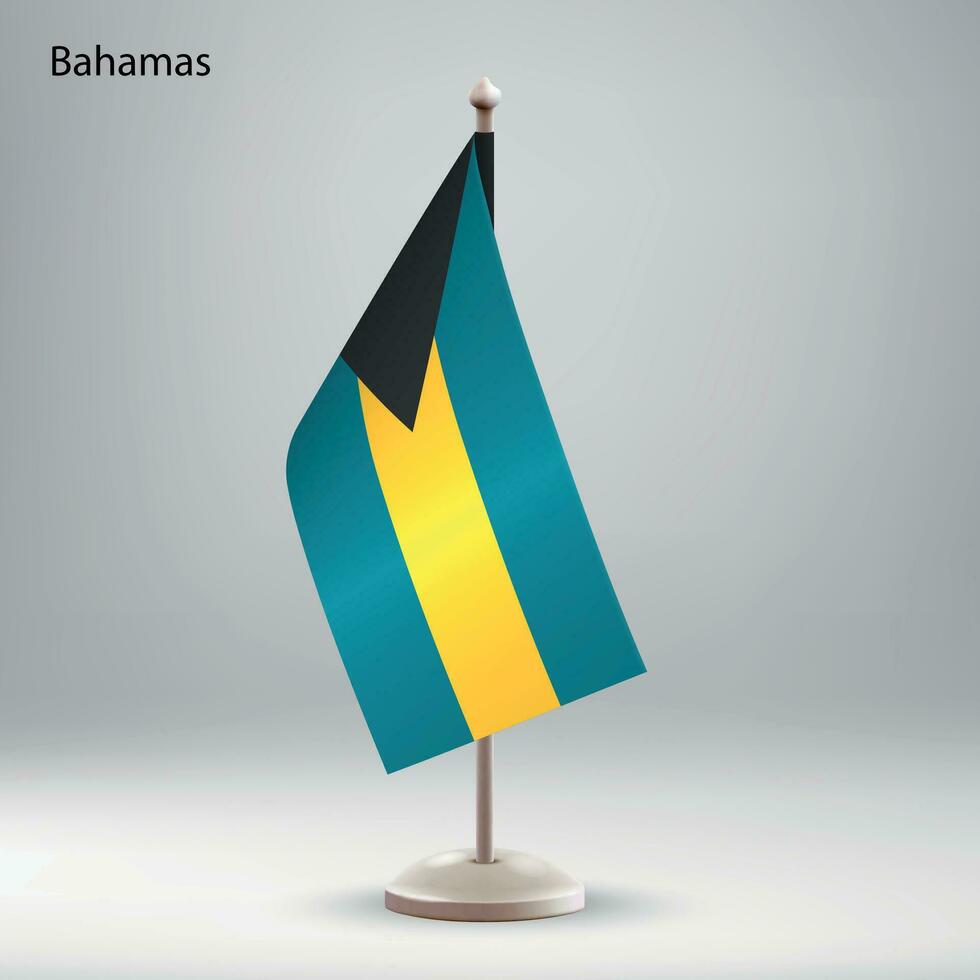 drapeau de Bahamas pendaison sur une drapeau rester. vecteur