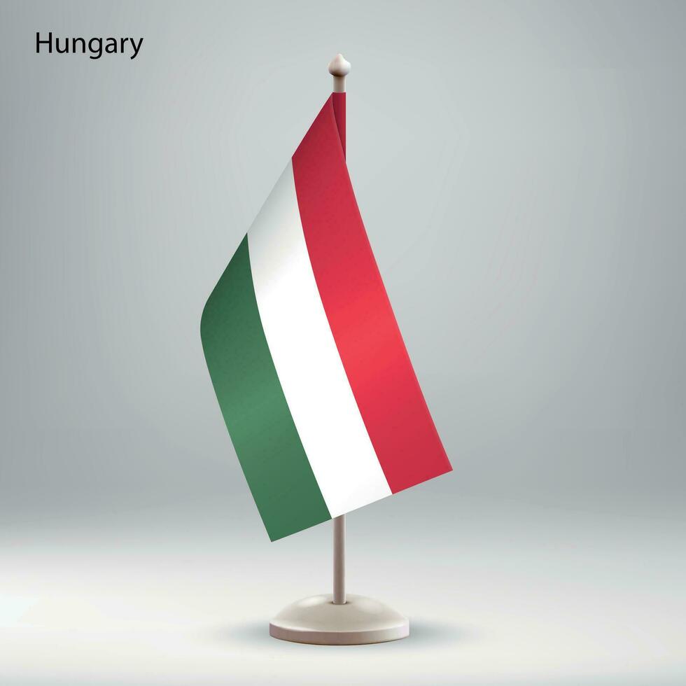 drapeau de Hongrie pendaison sur une drapeau rester. vecteur