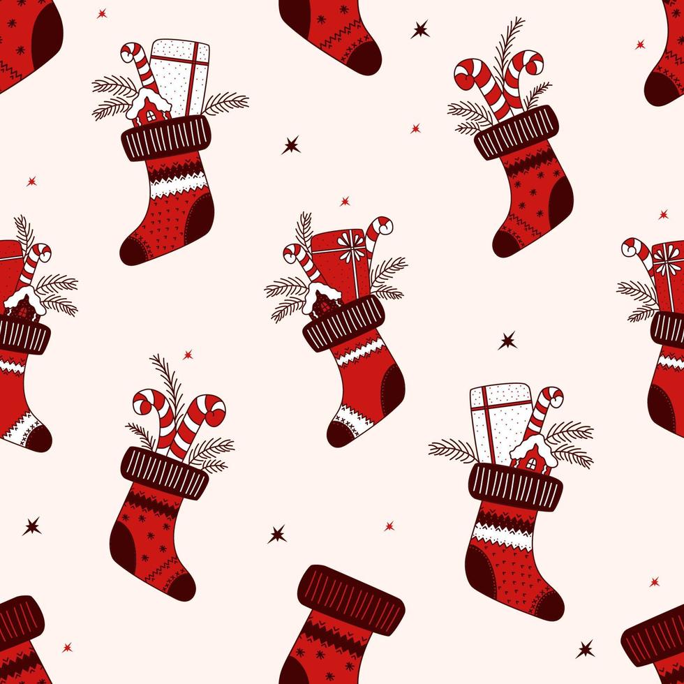 modèle sans couture de Noël. chaussette rouge de noël avec des cadeaux et des chocolats. illustration vectorielle vecteur