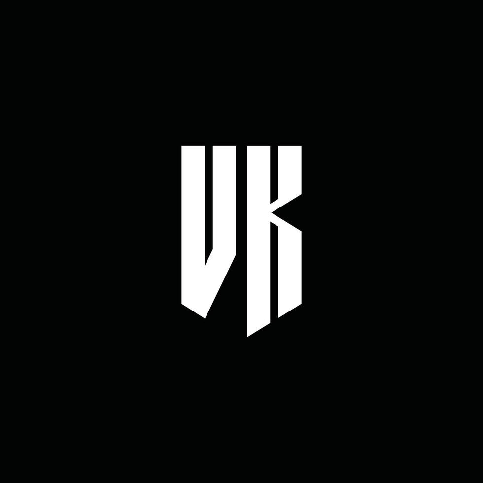 monogramme du logo vk avec style emblème isolé sur fond noir vecteur