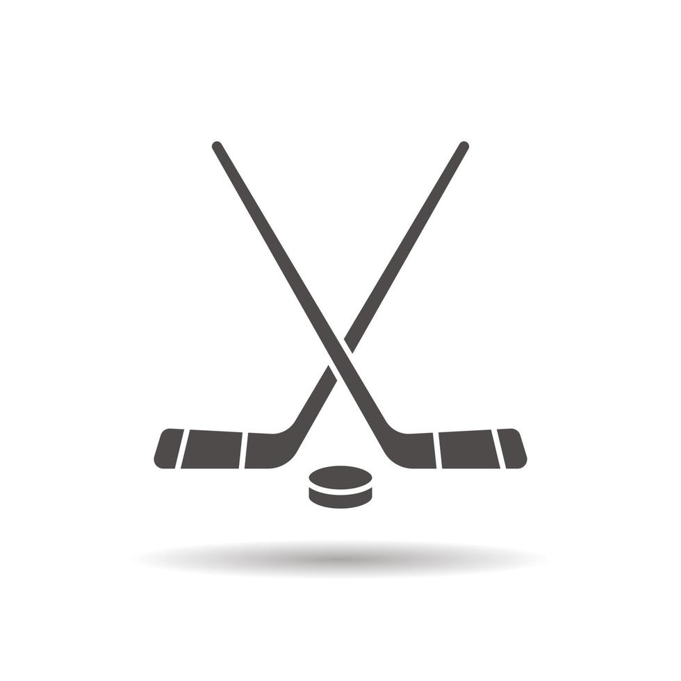 icône d'équipement de jeu de hockey. symbole de silhouette d'ombre portée. bâtons de hockey et rondelle. espace négatif. illustration vectorielle isolée vecteur