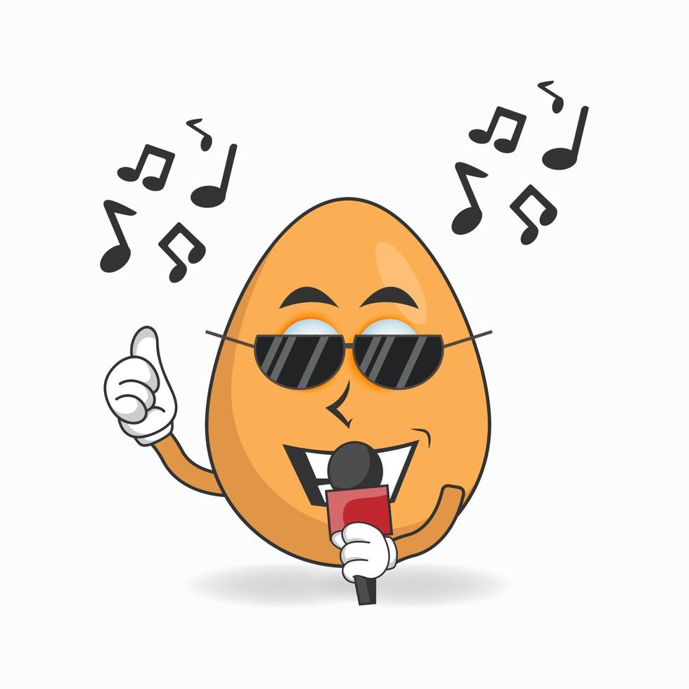 le personnage de la mascotte des œufs chante. illustration vectorielle vecteur