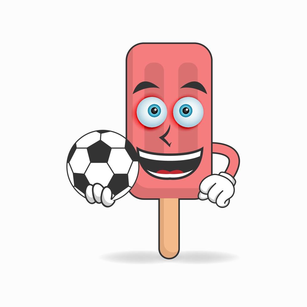 le personnage mascotte de la crème glacée rouge devient un joueur de football. illustration vectorielle vecteur