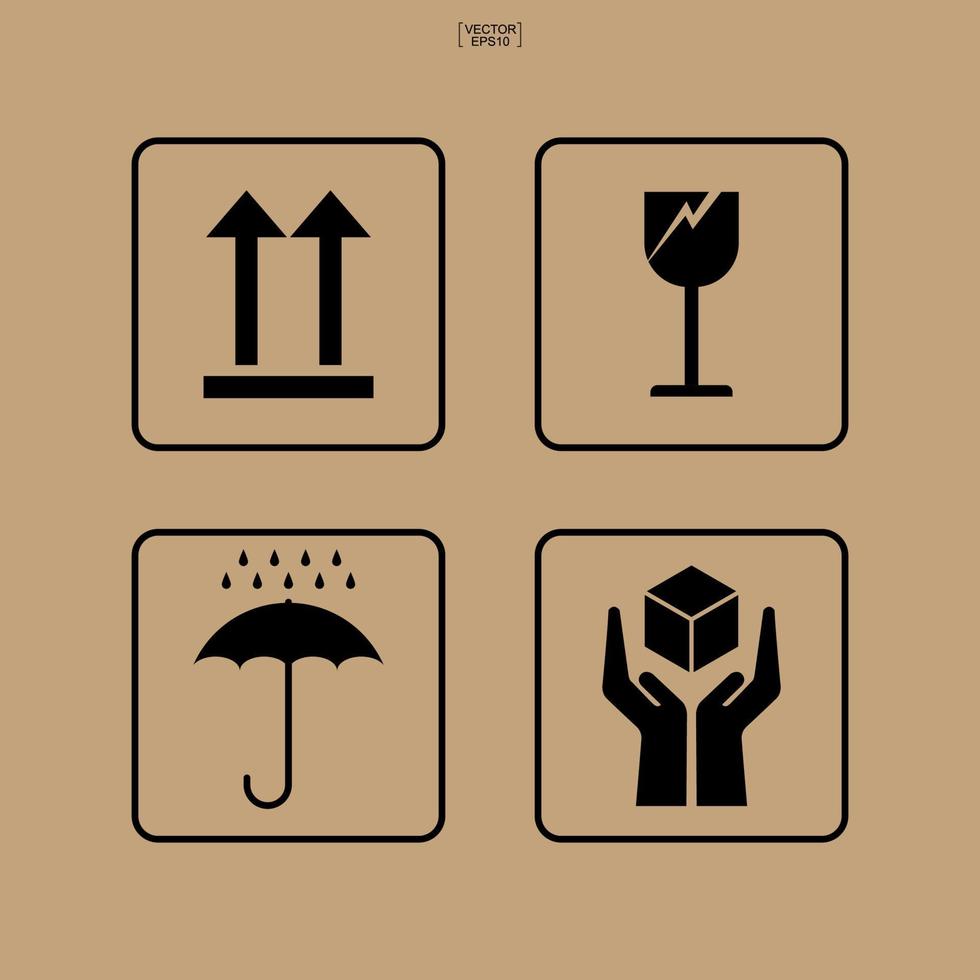 ensemble d'icônes d'emballage de signe et symbole de soins fragiles sur fond de carton brun. vecteur. vecteur