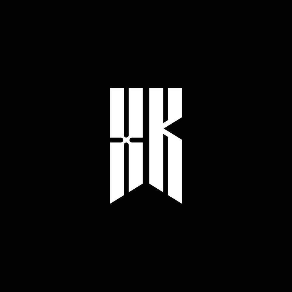 monogramme du logo xk avec style emblème isolé sur fond noir vecteur