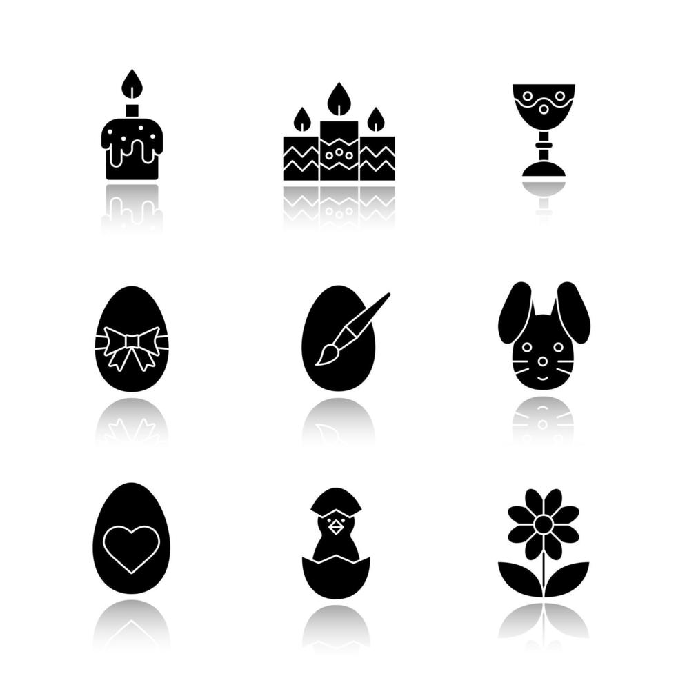 ensemble d'icônes noires d'ombre portée de pâques. bougies, gobelet, poulet nouveau-né en coquille d'oeuf, fleur, lapin de pâques et oeufs. illustrations vectorielles isolées vecteur