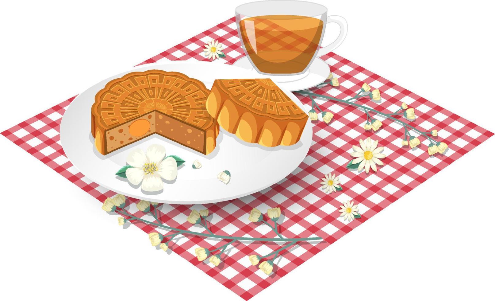 Gâteau de lune au jaune d'œuf salé avec une tasse de thé sur une nappe vecteur