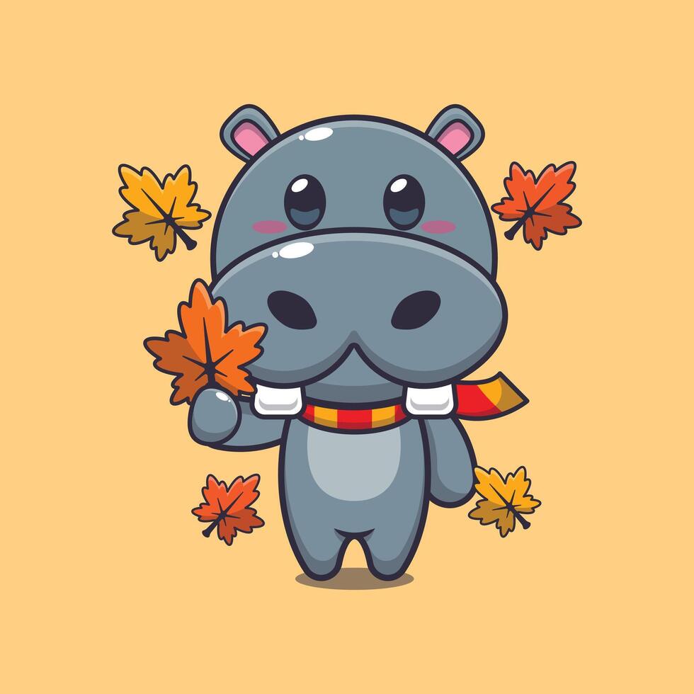 mignonne hippopotame en portant l'automne feuille. vecteur