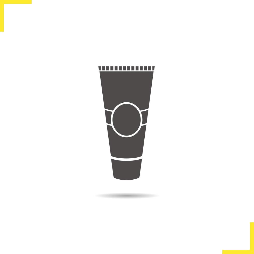 icône de tube de crème. symbole de silhouette de dentifrice ombre portée. crème après-rasage. espace négatif. illustration vectorielle isolée vecteur