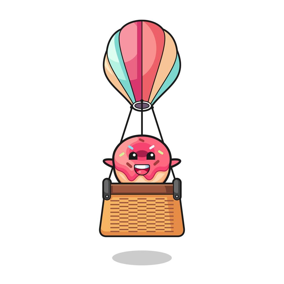 mascotte de donut chevauchant une montgolfière vecteur