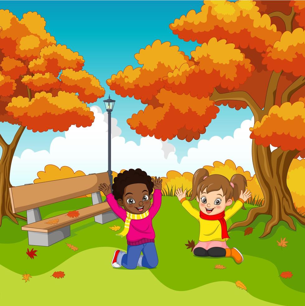 dessin animé enfants heureux dans le parc en automne vecteur