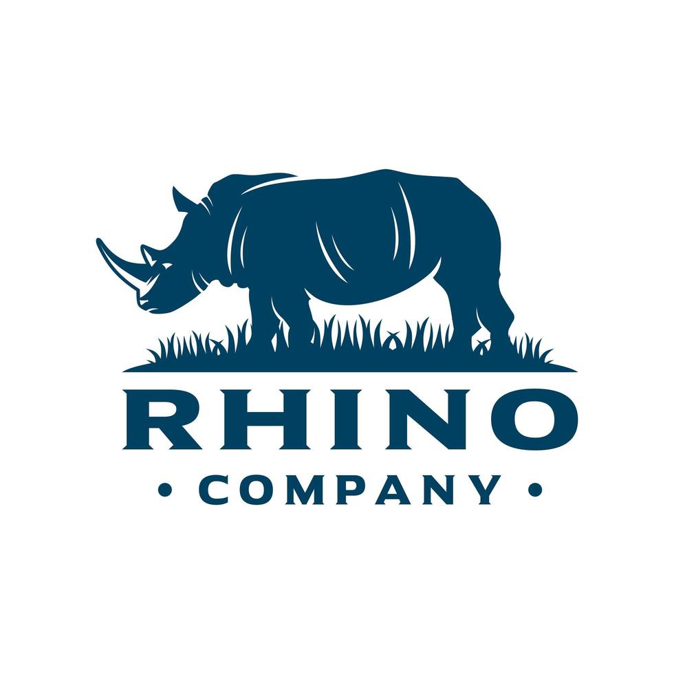 logo de rhinocéros sur l'herbe vecteur