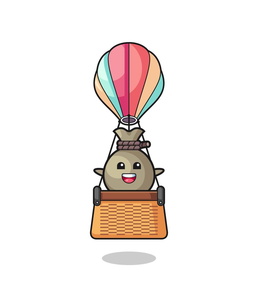 mascotte de sac d'argent chevauchant une montgolfière vecteur