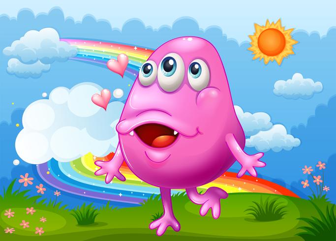 Un joyeux monstre rose dansant au sommet d&#39;une colline avec un arc-en-ciel dans le ciel vecteur