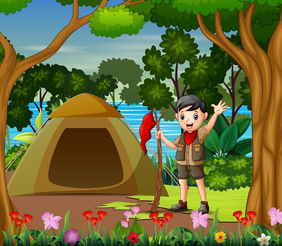 scout garçon tenant un drapeau rouge sur le camping vecteur