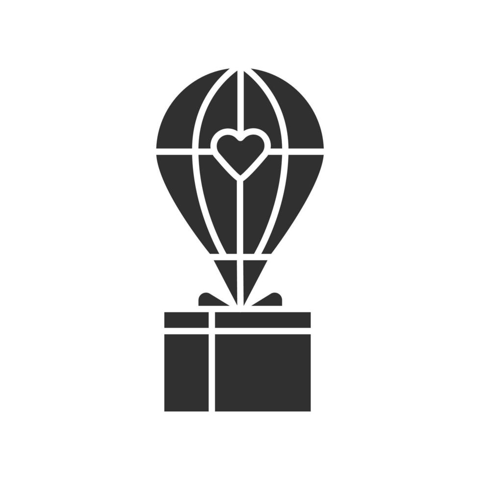 icône de glyphe d'aide humanitaire. livraison d'aide aux personnes dans le besoin. ballon à air chaud avec boîte. soutien matériel, alimentaire et en biens. symbole de la silhouette. espace négatif. illustration vectorielle isolée vecteur