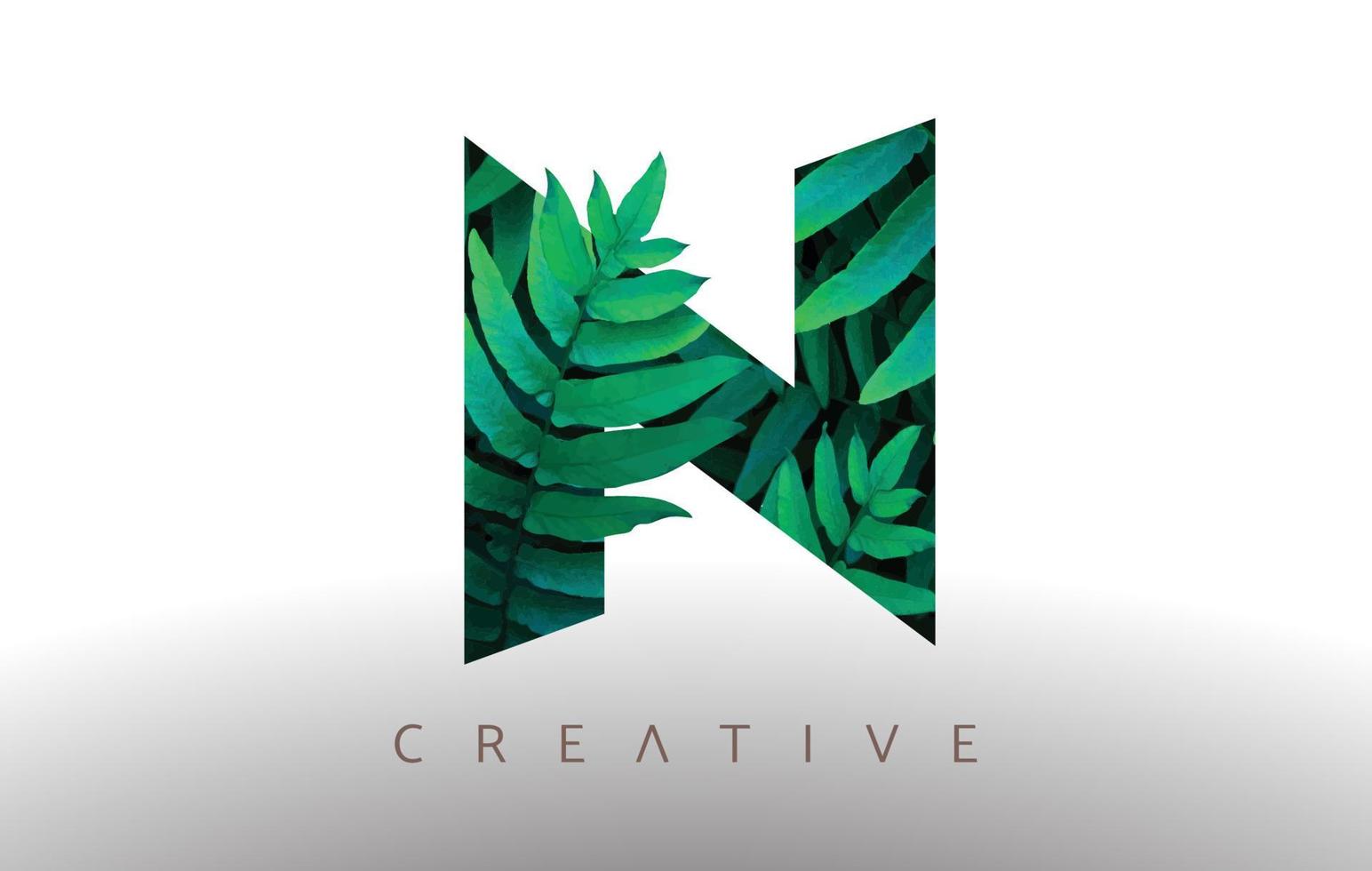 icône de conception de logo de lettre n de feuille écologique verte botanique faite de feuilles vertes qui sortent de la lettre. vecteur