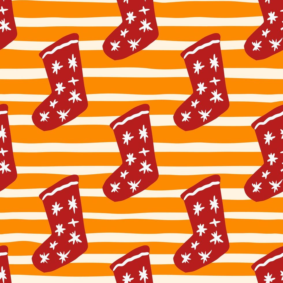 modèle sans couture de doodle avec ornement de chaussettes de nouvel an. éléments de vêtements rouges de noël avec des étoiles sur fond orange dépouillé. vecteur