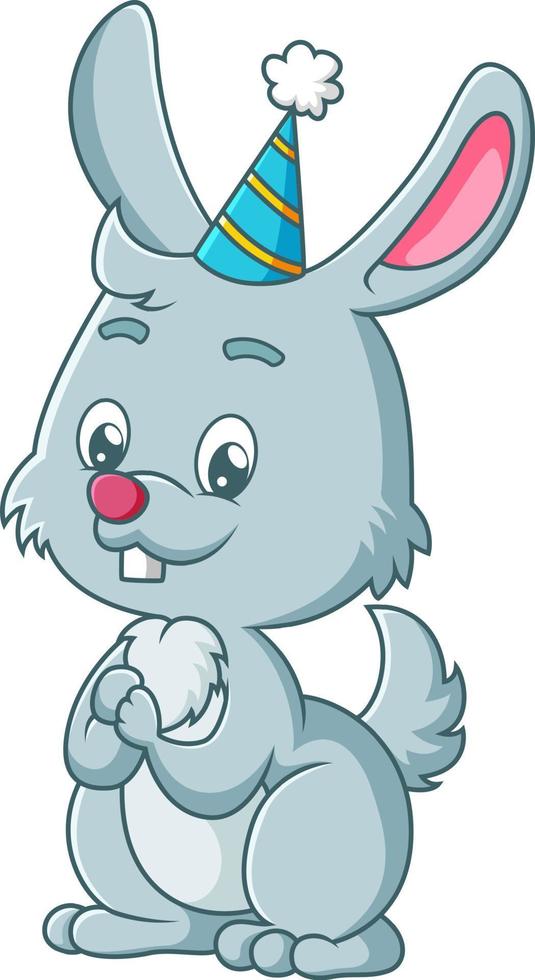 le lapin heureux porte le chapeau d'anniversaire vecteur