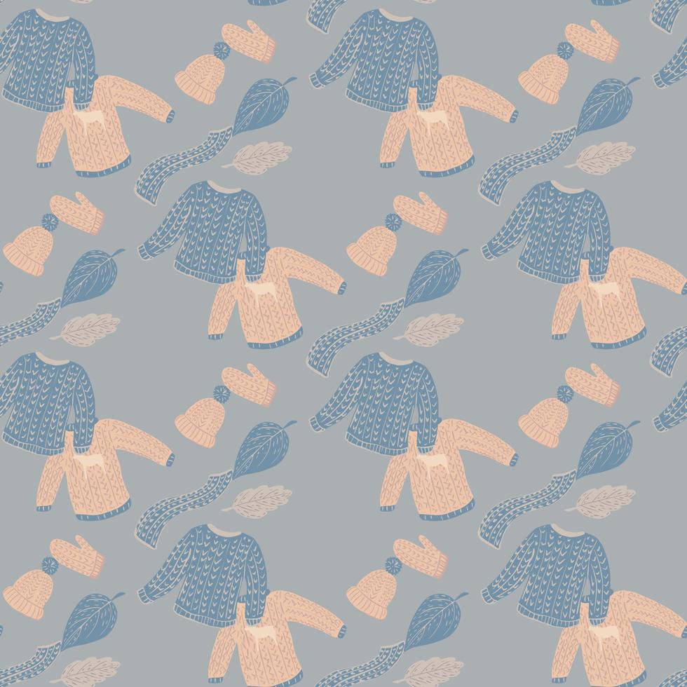 motif confortable sans couture de noël avec silhouette de pulls, mitaines, écharpes et chapeaux. palette bleue et rose. vecteur