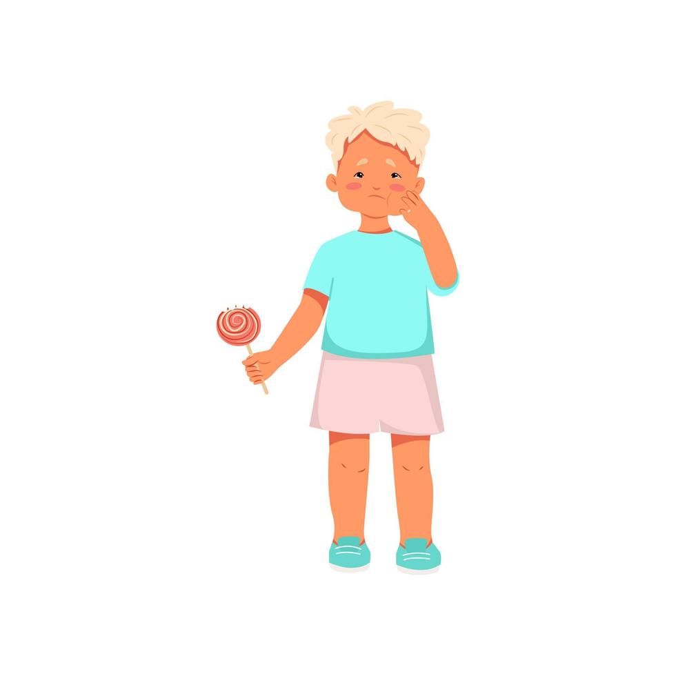 concept de dents saines chez les enfants. garçon tient un bonbon dans sa main et pleure d'un mal de dents. joue enflée. illustration vectorielle. vecteur