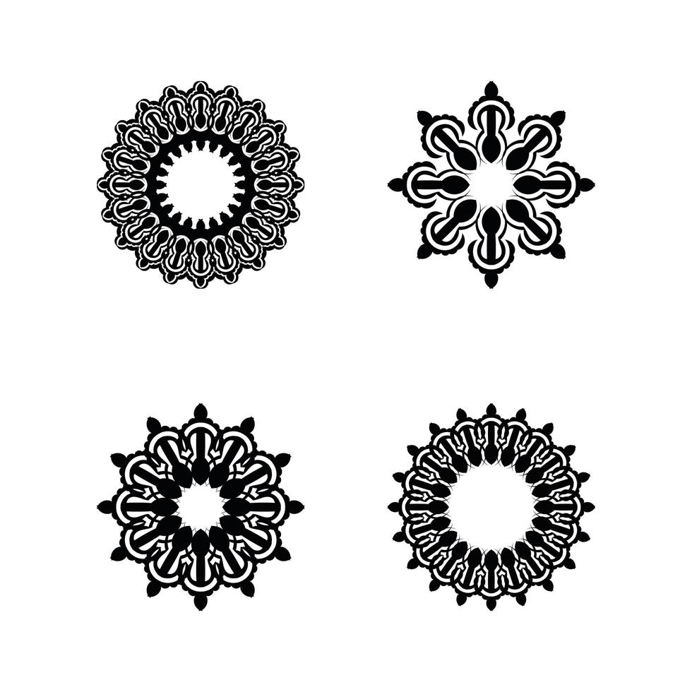 ensemble de 4 ornements de mandala isolés. illustration de voile. vecteur