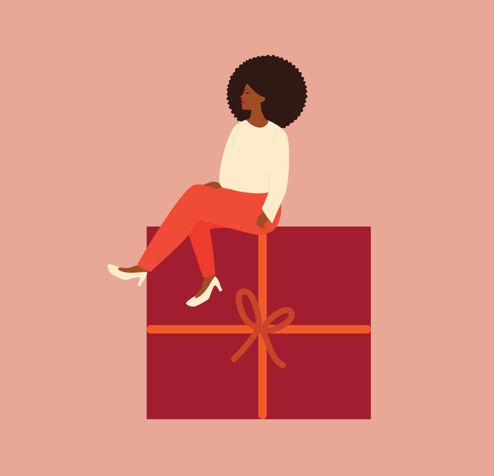 jeune femme afro-américaine est assise sur un gros cadeau. concept festif pour la fête des femmes, la fête des mères ou les vacances avec une femme heureuse assise sur une boîte rouge avec ruban. illustration vectorielle vecteur