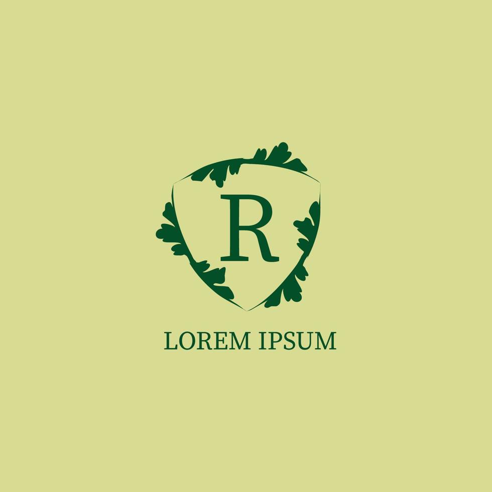 modèle de conception de logo alphabétique lettre r isolé sur la couleur beige vert. illustration de signe de bouclier floral décoratif. garde de la nature, concept de logo de sécurité. vecteur