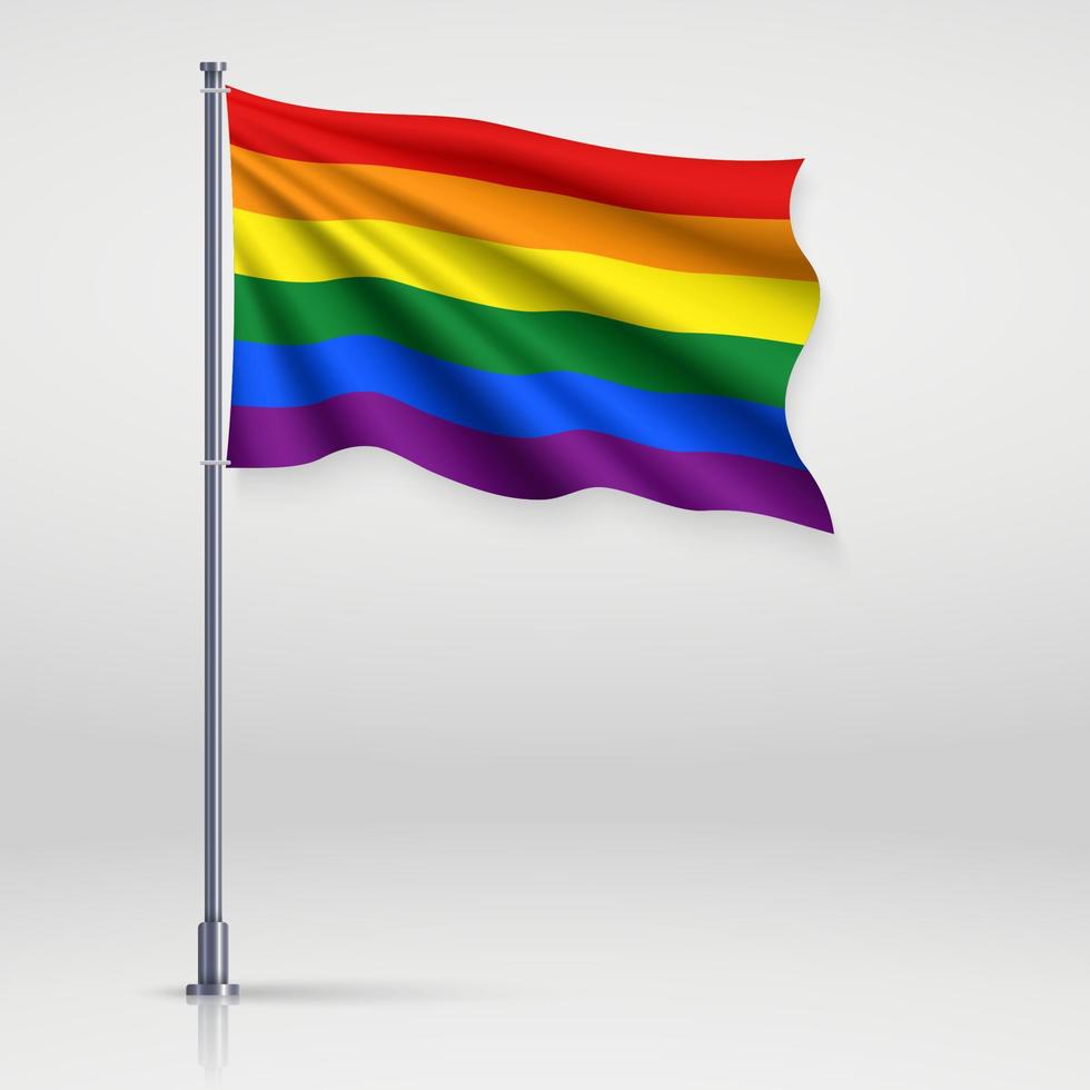 agitant un ruban ou une bannière avec le drapeau de la fierté lgbt. vecteur