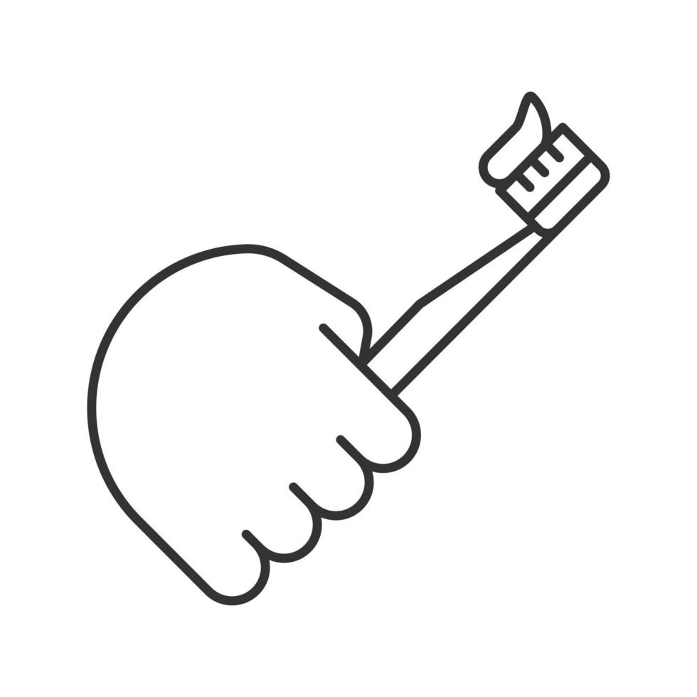 main tenant l'icône linéaire de la brosse à dents. illustration de la ligne mince. brossage de dents. symbole de contour. dessin de contour isolé de vecteur