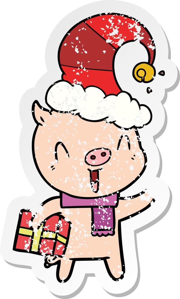 autocollant en détresse d'un cochon de dessin animé heureux avec un cadeau de Noël vecteur