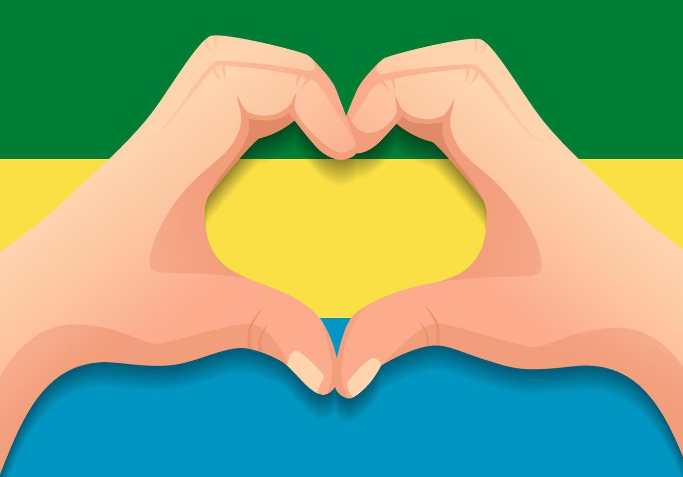 drapeau du gabon et forme de coeur à la main vecteur