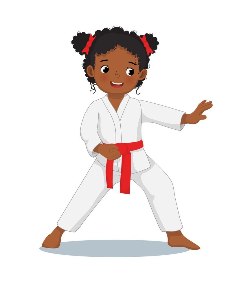 jolie petite fille africaine de karaté kid avec ceinture rouge montrant des techniques de défense de la main pose dans la pratique de la formation d'arts martiaux vecteur